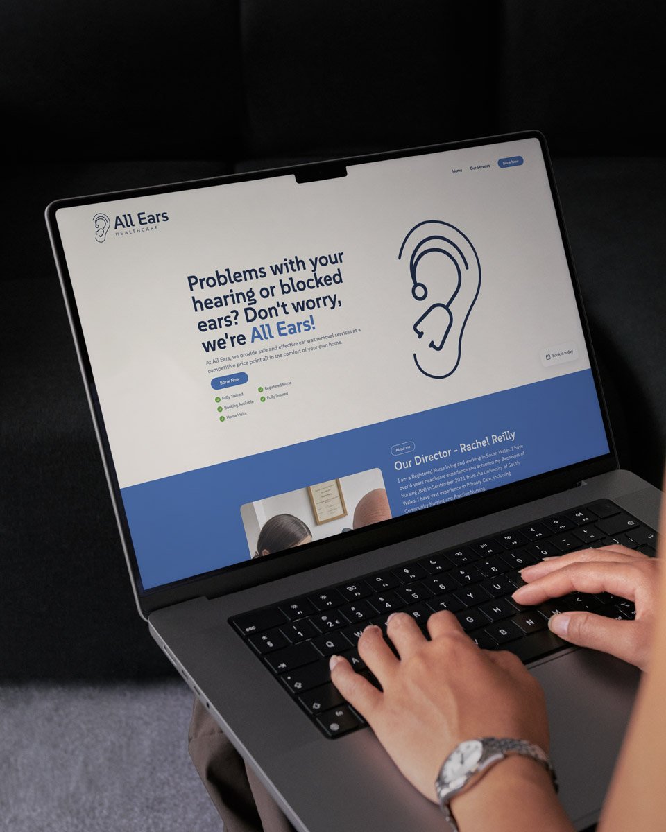 All Ears Healthcare website displayed on a laptop